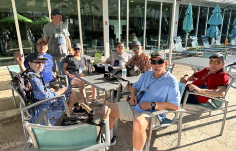 Highlight Vacations travelers hanging out by the pool