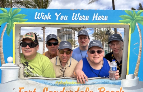 travelers in a sign that says "wish you were Here, Fort Lauderdale beach"