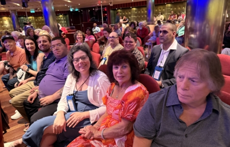 Travelers and staff at one of the ship shows.