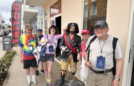 Travelers standing in front of pirate statue of Bonaire