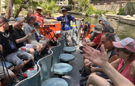 The group is on one of the boat for the riverwalk cruise
